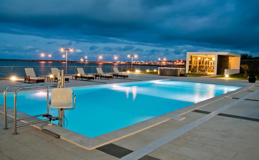 Bazén v ubytování Atlantida Mar Hotel nebo v jeho okolí