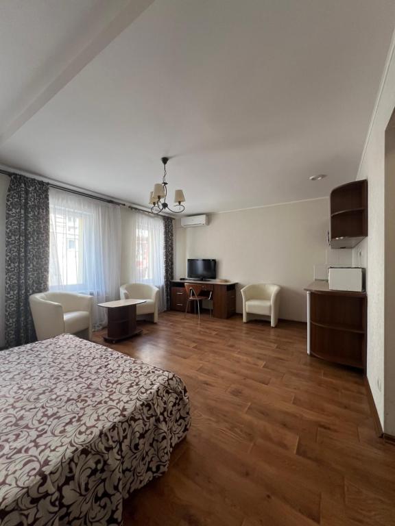 TV a/nebo společenská místnost v ubytování Apart hotel Asotel
