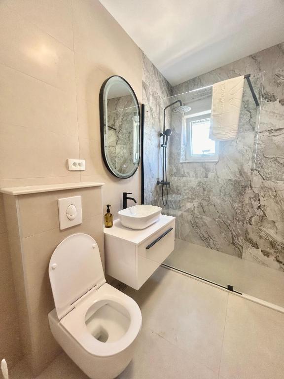 Koupelna v ubytování Apartmani Andrea