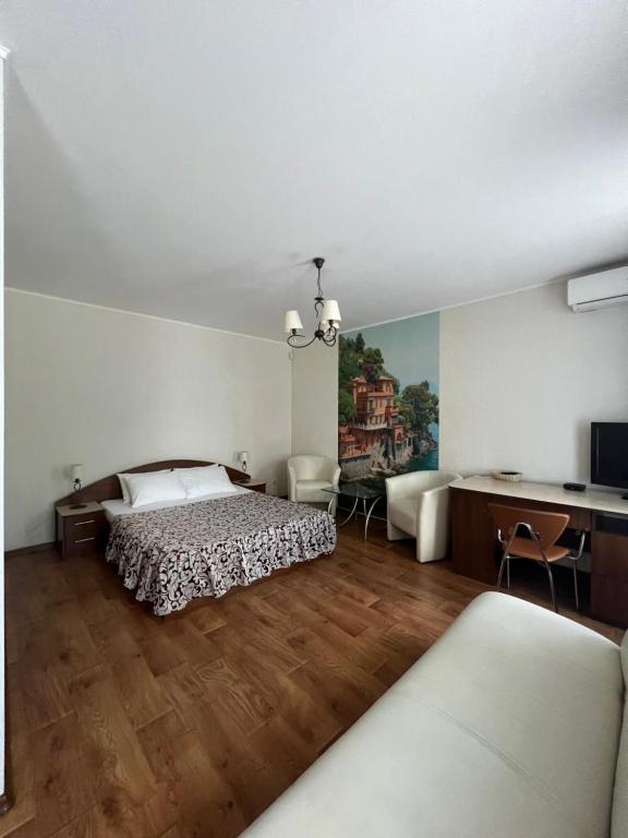 Postel nebo postele na pokoji v ubytování Apart hotel Asotel
