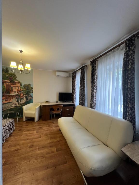 TV a/nebo společenská místnost v ubytování Apart hotel Asotel
