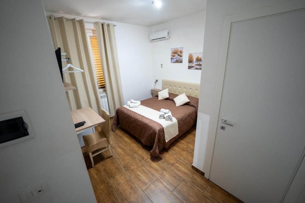 Postel nebo postele na pokoji v ubytování B&B Villa Achibea