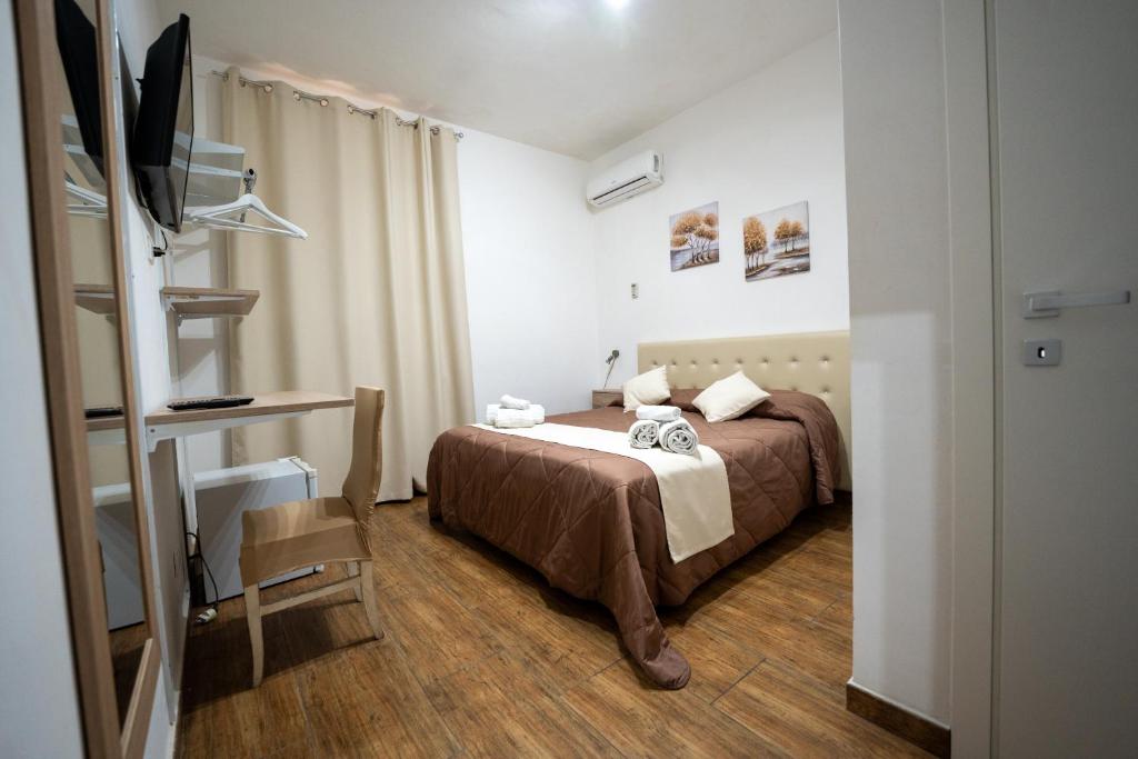 Postel nebo postele na pokoji v ubytování B&B Villa Achibea
