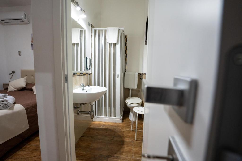 Postel nebo postele na pokoji v ubytování B&B Villa Achibea