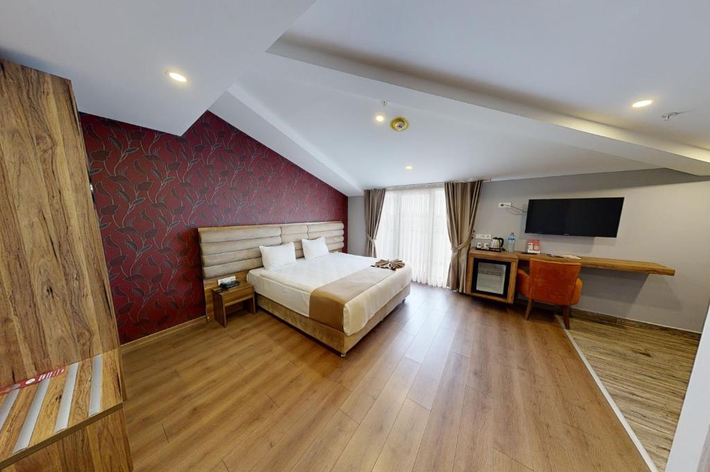 TV a/nebo společenská místnost v ubytování King City Hotel Istanbul Ataturk Airport