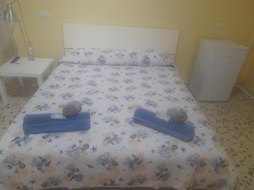 a bedroom with a bed with two wheels on it at Bed and fly Aeroporto Fontanarossa reception h24 in Catania