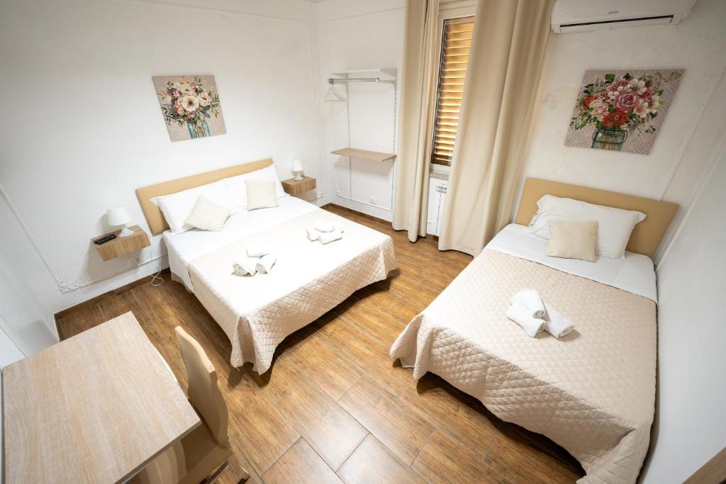 Postel nebo postele na pokoji v ubytování B&B Villa Achibea
