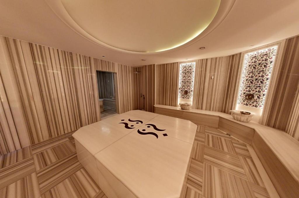 Postel nebo postele na pokoji v ubytování King City Hotel Istanbul Ataturk Airport