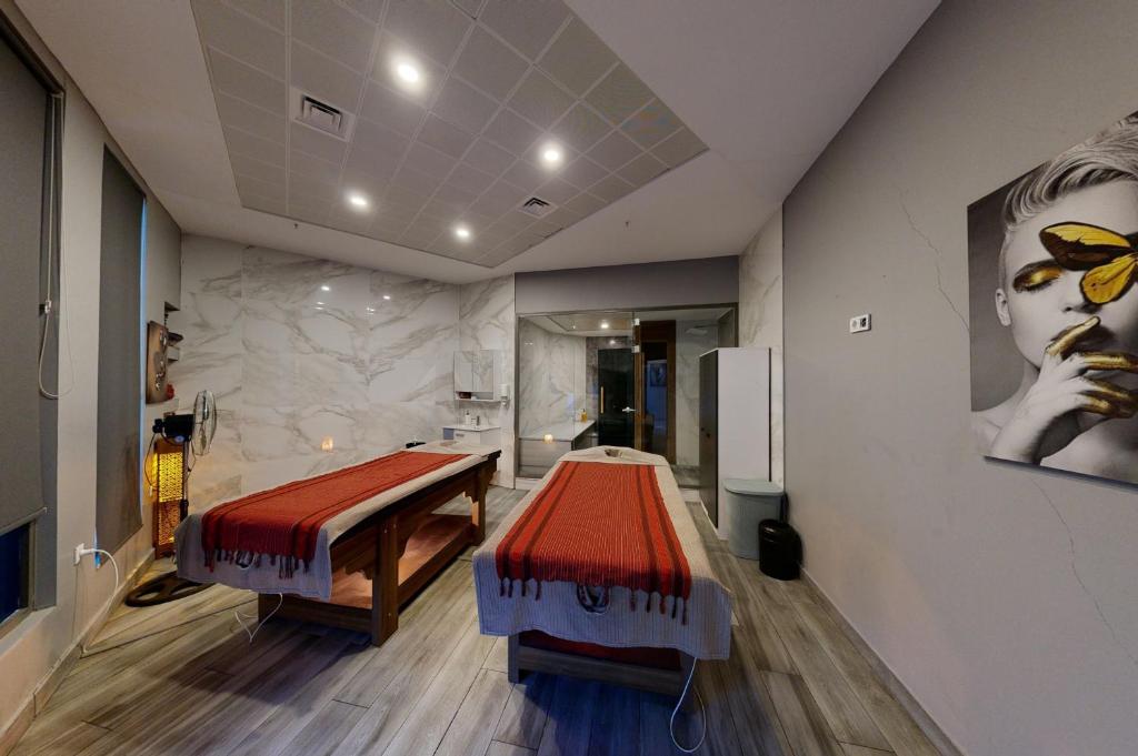 Postel nebo postele na pokoji v ubytování King City Hotel Istanbul Ataturk Airport