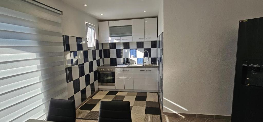Kuchyň nebo kuchyňský kout v ubytování Aphrodite Apartment