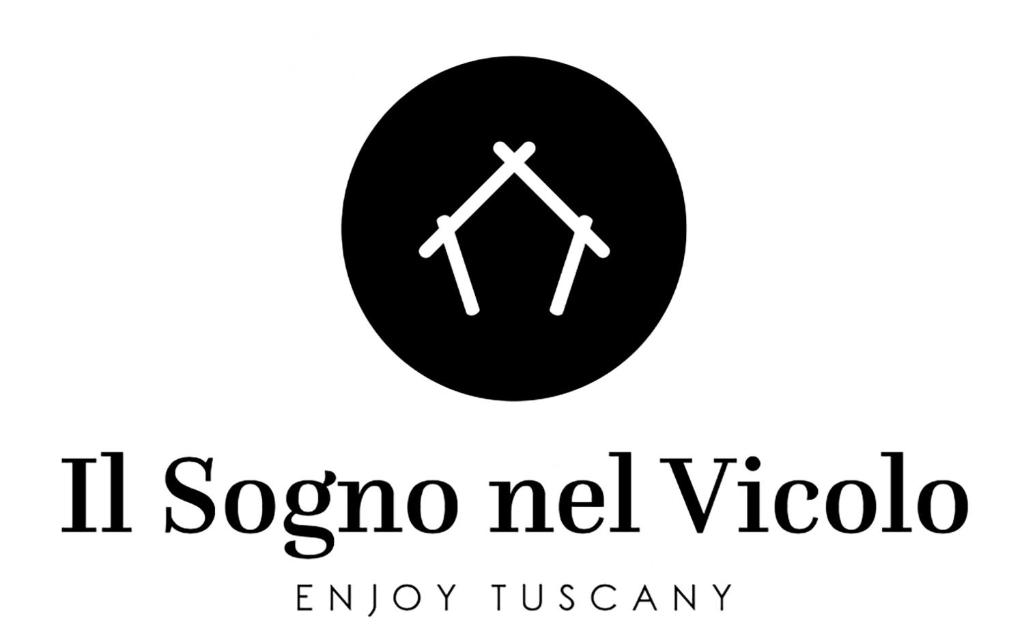 a logo for a music festival in a black circle at II Sogno nel Vicolo in Pisa