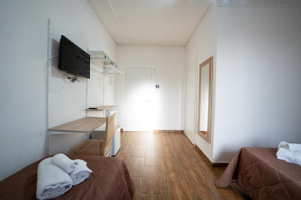 TV a/nebo společenská místnost v ubytování B&B Villa Achibea