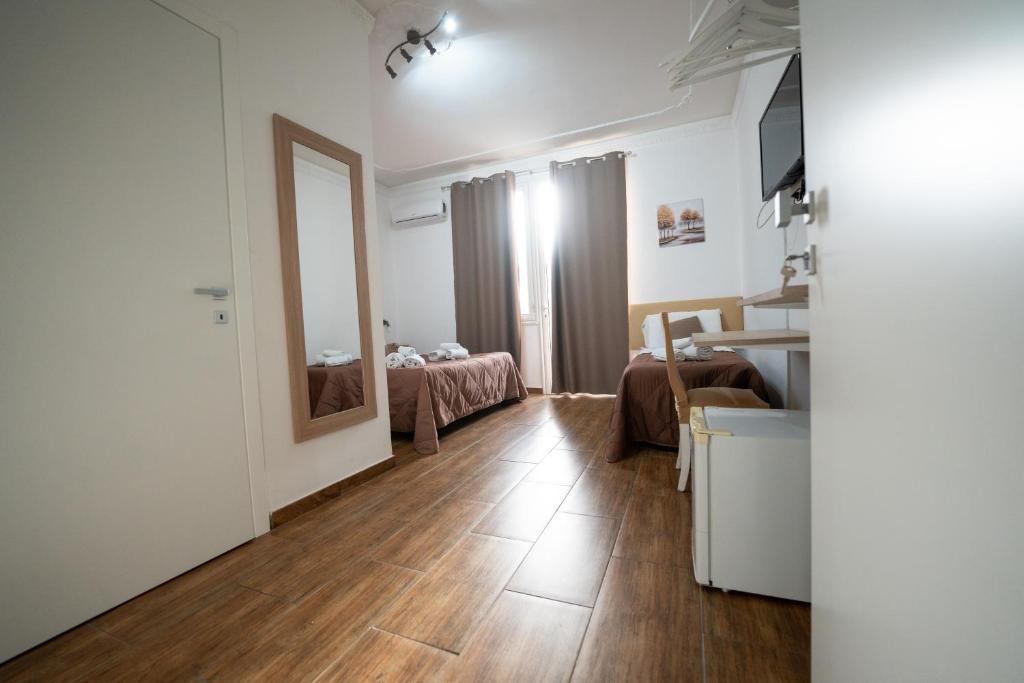 Postel nebo postele na pokoji v ubytování B&B Villa Achibea