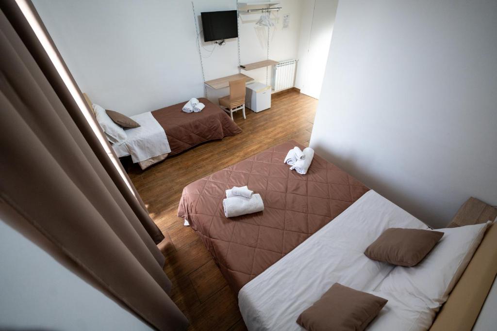 Postel nebo postele na pokoji v ubytování B&B Villa Achibea
