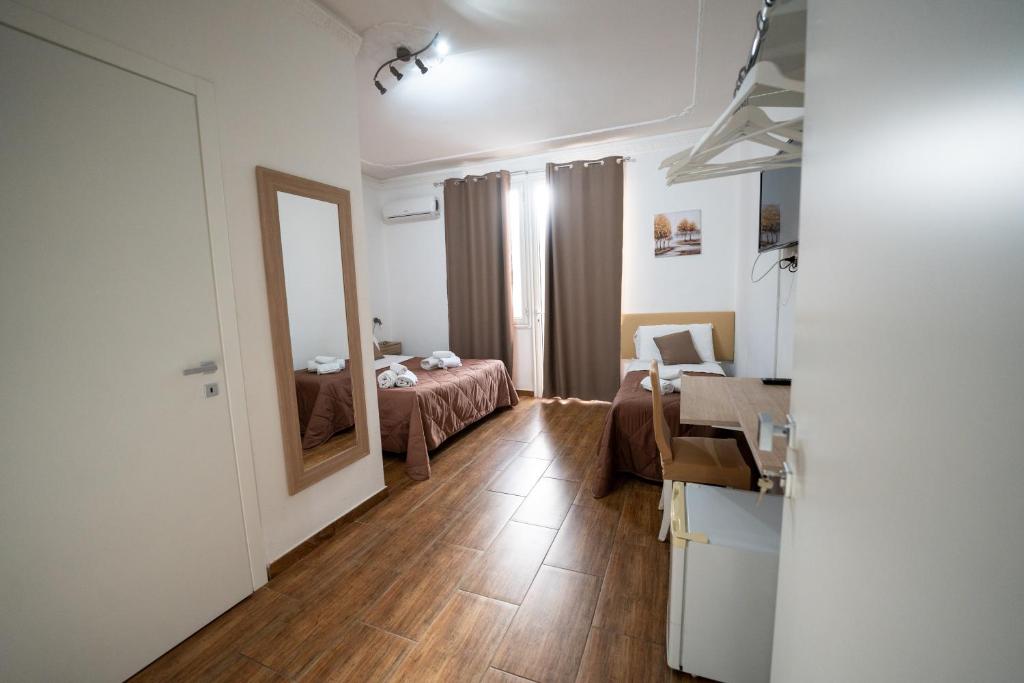 Postel nebo postele na pokoji v ubytování B&B Villa Achibea