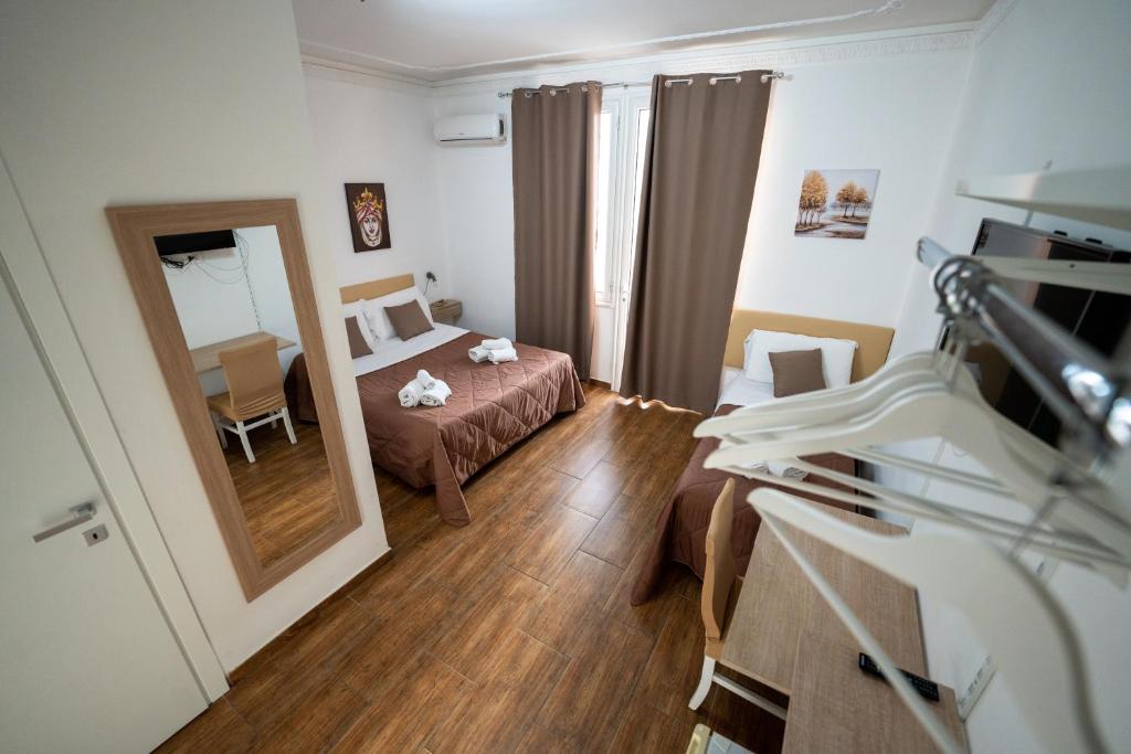 Postel nebo postele na pokoji v ubytování B&B Villa Achibea