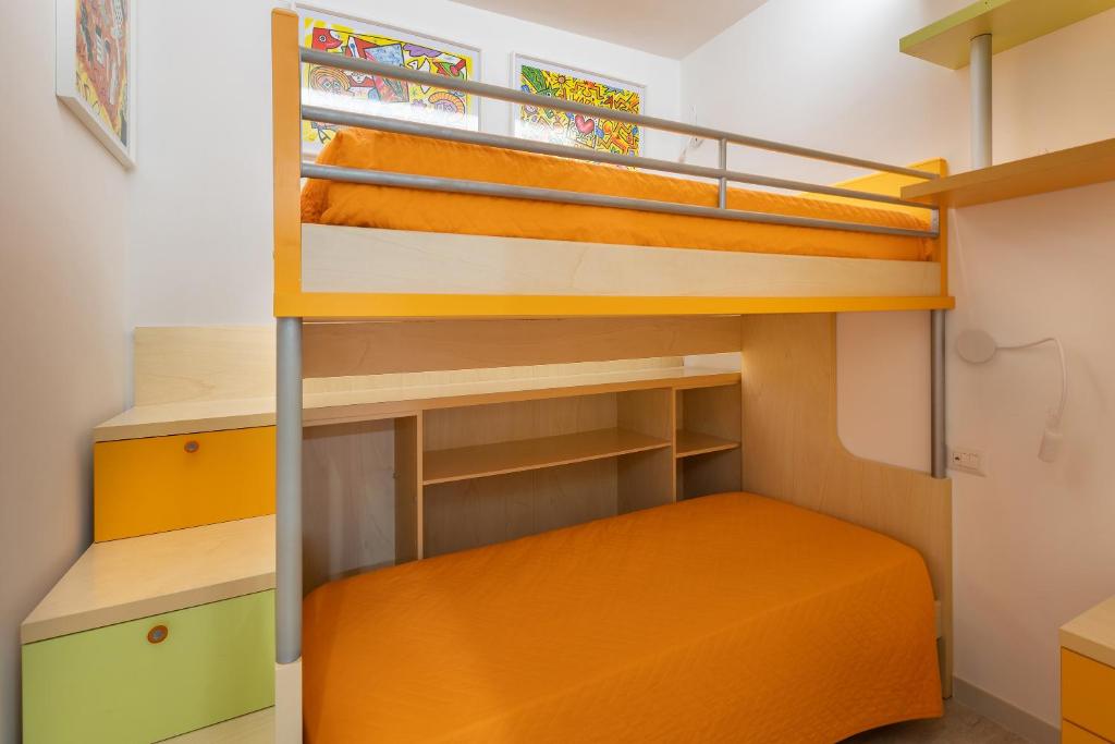 A bed or beds in a room at A Casa di Anna by BarbarHouse
