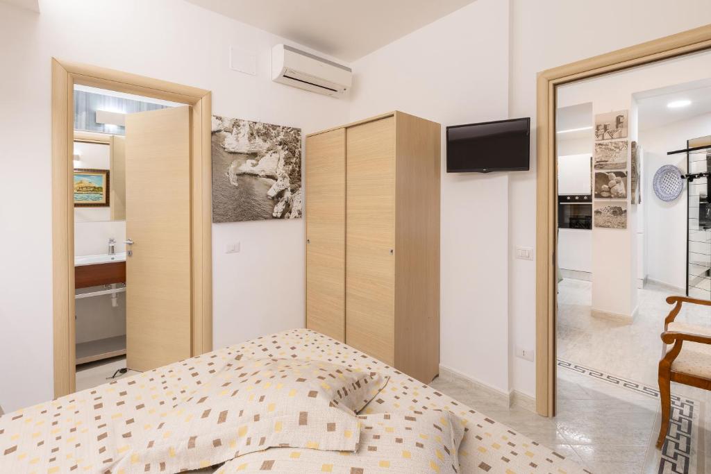 A kitchen or kitchenette at A Casa di Anna by BarbarHouse