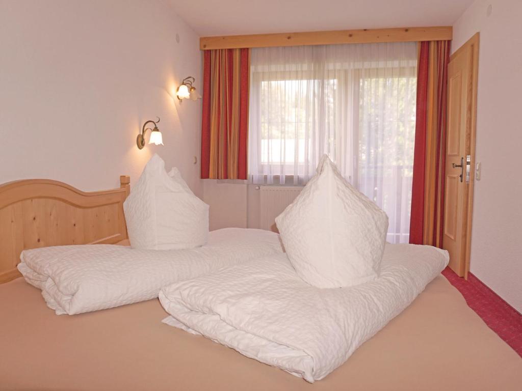Łóżko lub łóżka w pokoju w obiekcie Apartment Diana-3 by Interhome