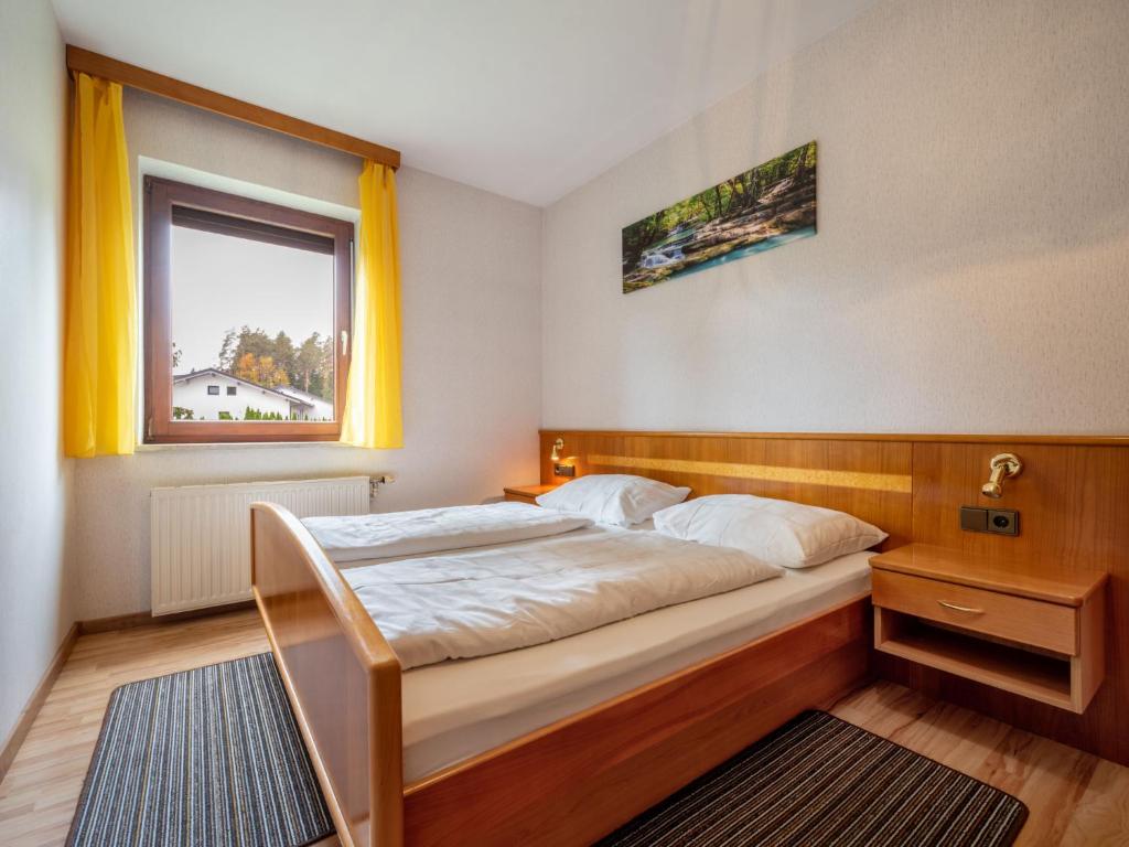 Postel nebo postele na pokoji v ubytování Apartment Kolm by Interhome