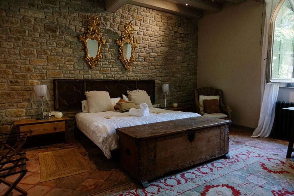 Postel nebo postele na pokoji v ubytování Hotel Finca El Peregrino