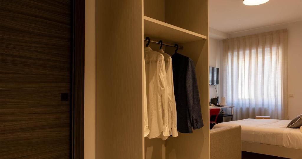 Postel nebo postele na pokoji v ubytování Firrao Rooms Matera