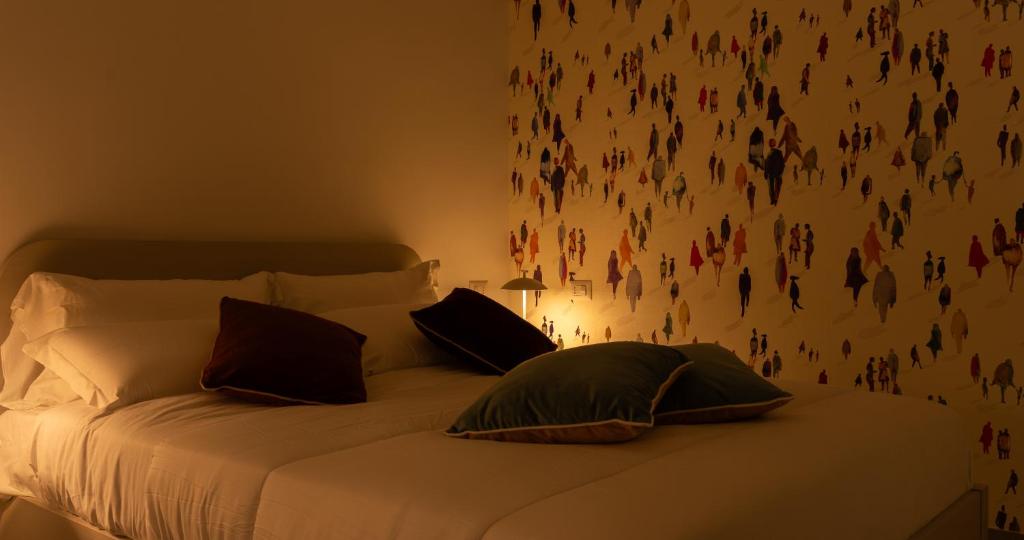 Postel nebo postele na pokoji v ubytování Firrao Rooms Matera