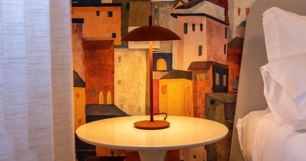 Postel nebo postele na pokoji v ubytování Firrao Rooms Matera