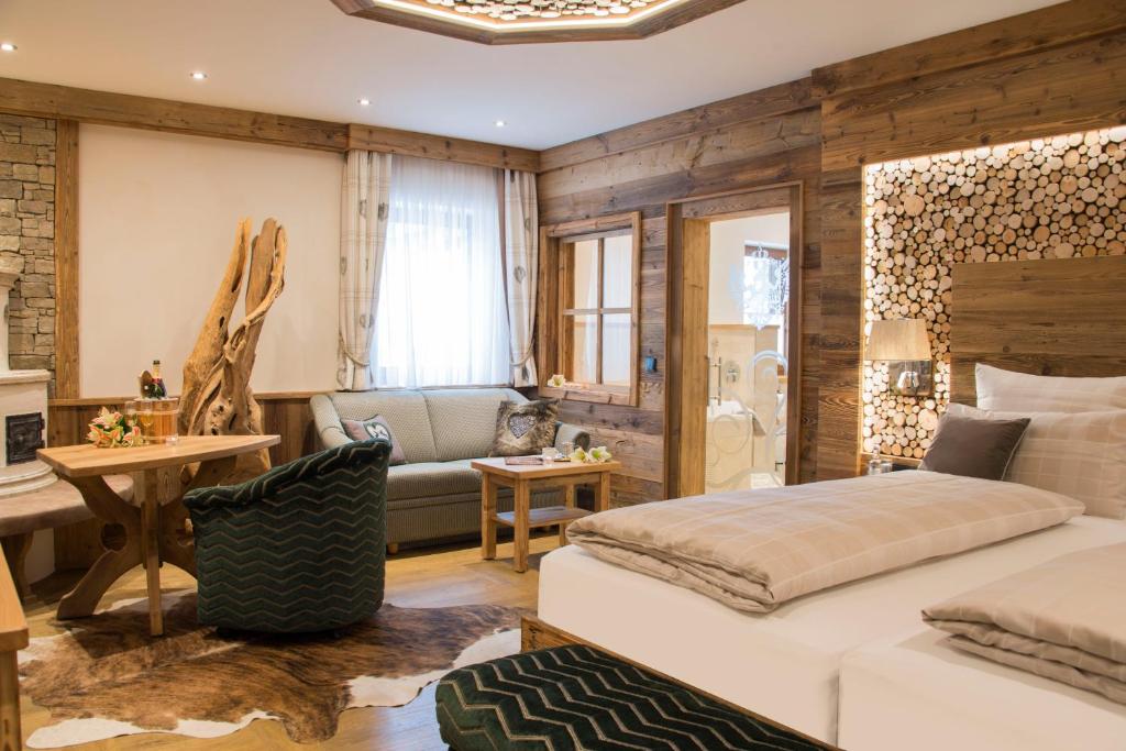 Postel nebo postele na pokoji v ubytování Wellness-Hotel ADLER