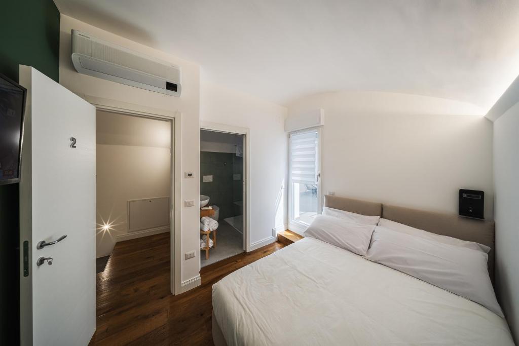 เตียงในห้องที่ Palazzo “Di Palma” Bed & Breakfast