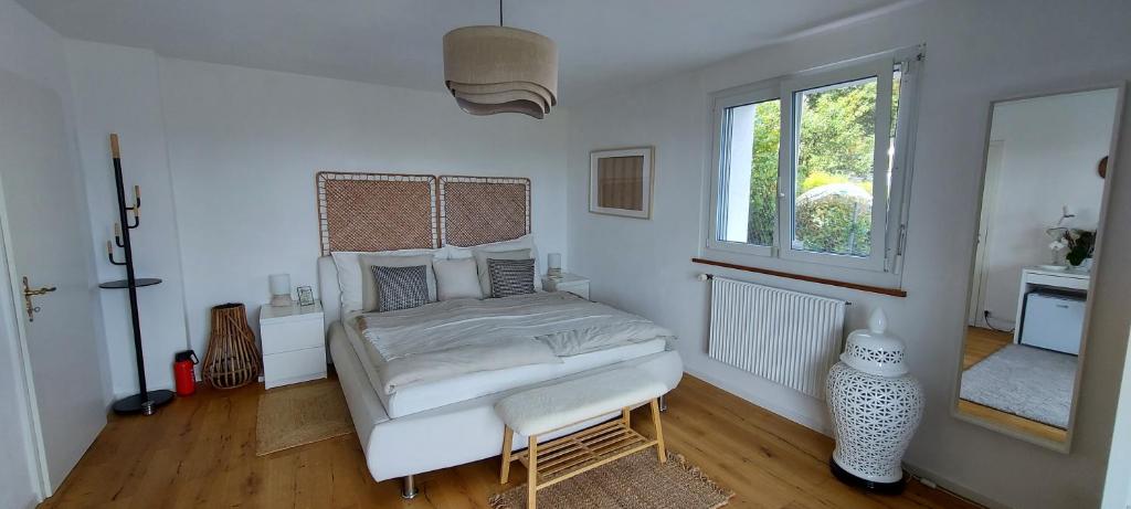 Voodi või voodid majutusasutuse Chambre d'hôtes des Rochettes toas