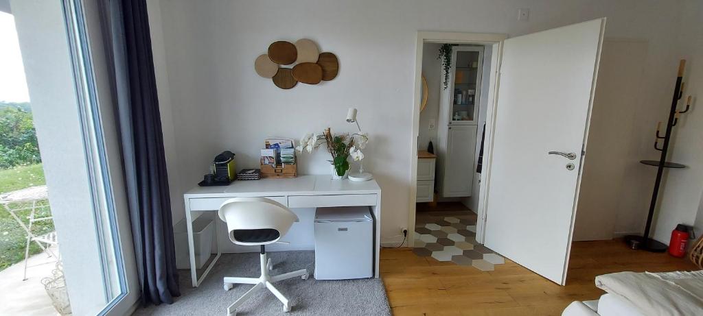 Foto sihtkohas Cornaux asuva majutusasutuse Chambre d'hôtes des Rochettes galeriist