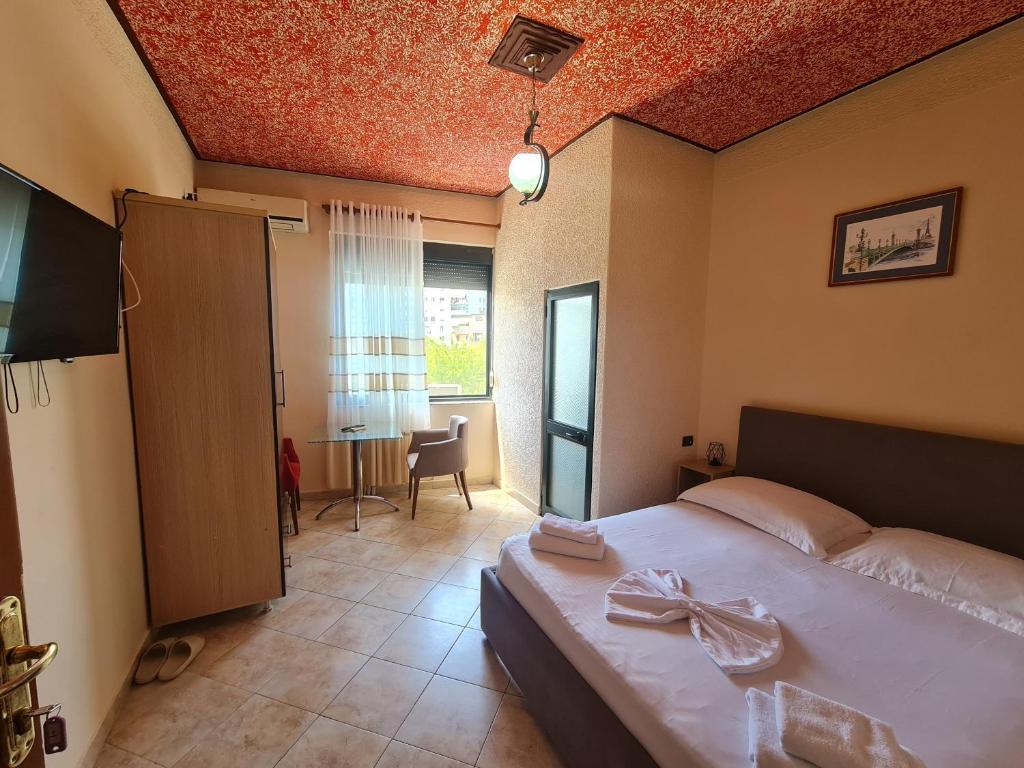 Postel nebo postele na pokoji v ubytování Hotel La Villa