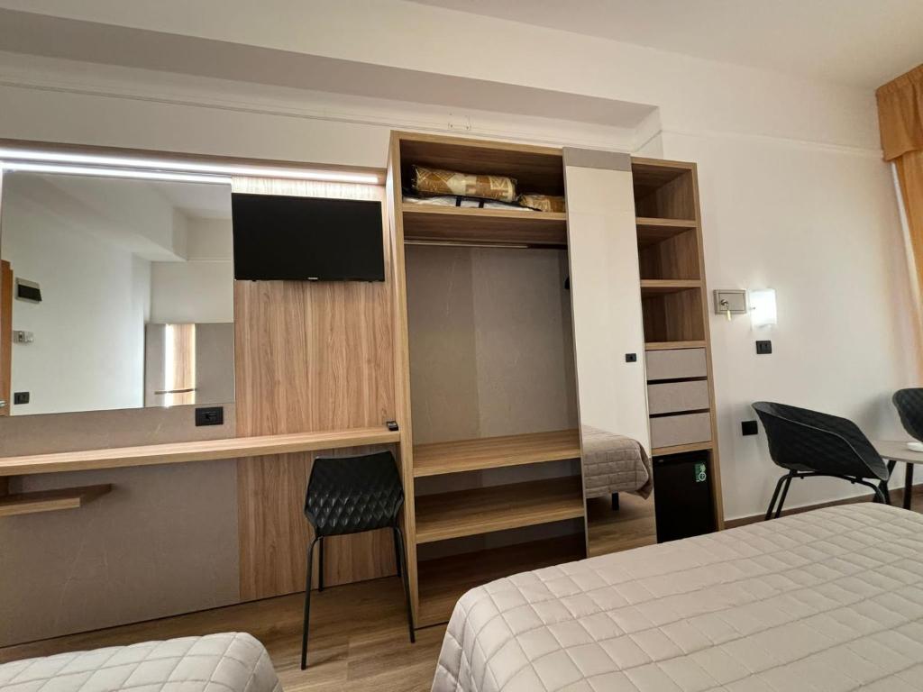 Postel nebo postele na pokoji v ubytování Hotel Cobalto