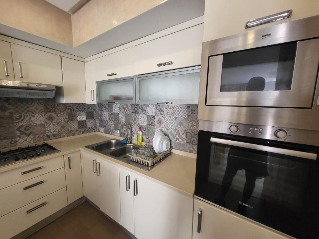 Kuchyň nebo kuchyňský kout v ubytování New appartement with à private pool