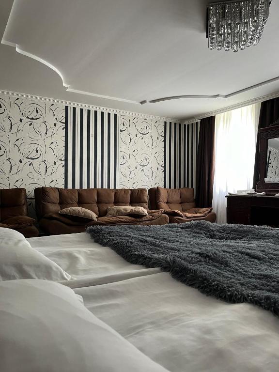 Postel nebo postele na pokoji v ubytování Guest House Misho