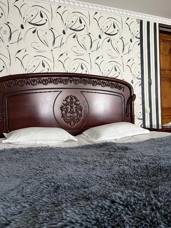 Postel nebo postele na pokoji v ubytování Guest House Misho