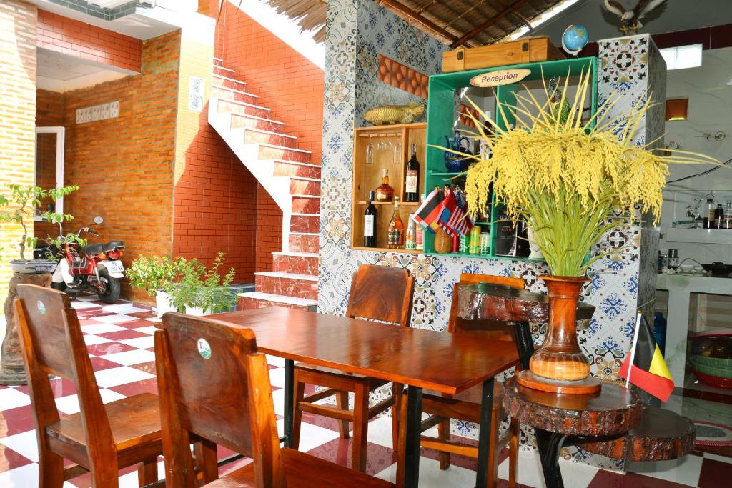 Posezení v ubytování BOSA Homestay - Mekong Riverside