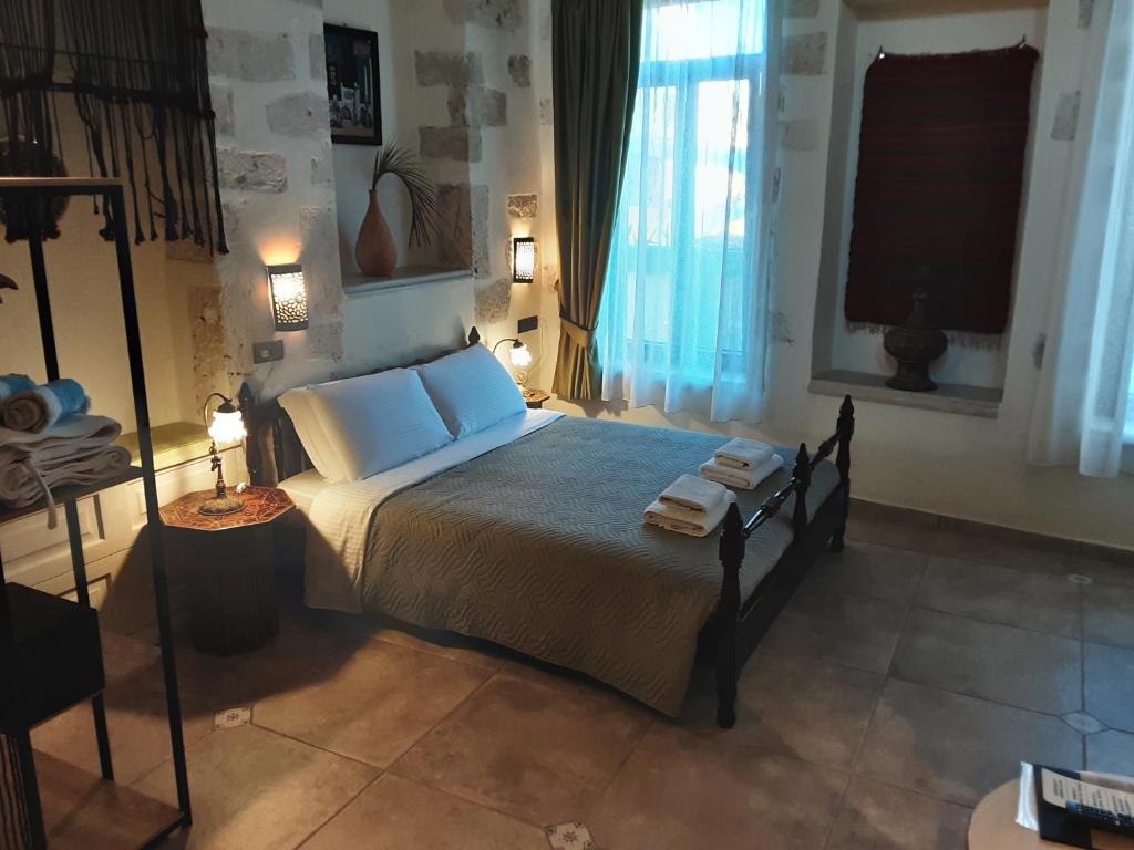 Postel nebo postele na pokoji v ubytování Hamam Oriental Suites