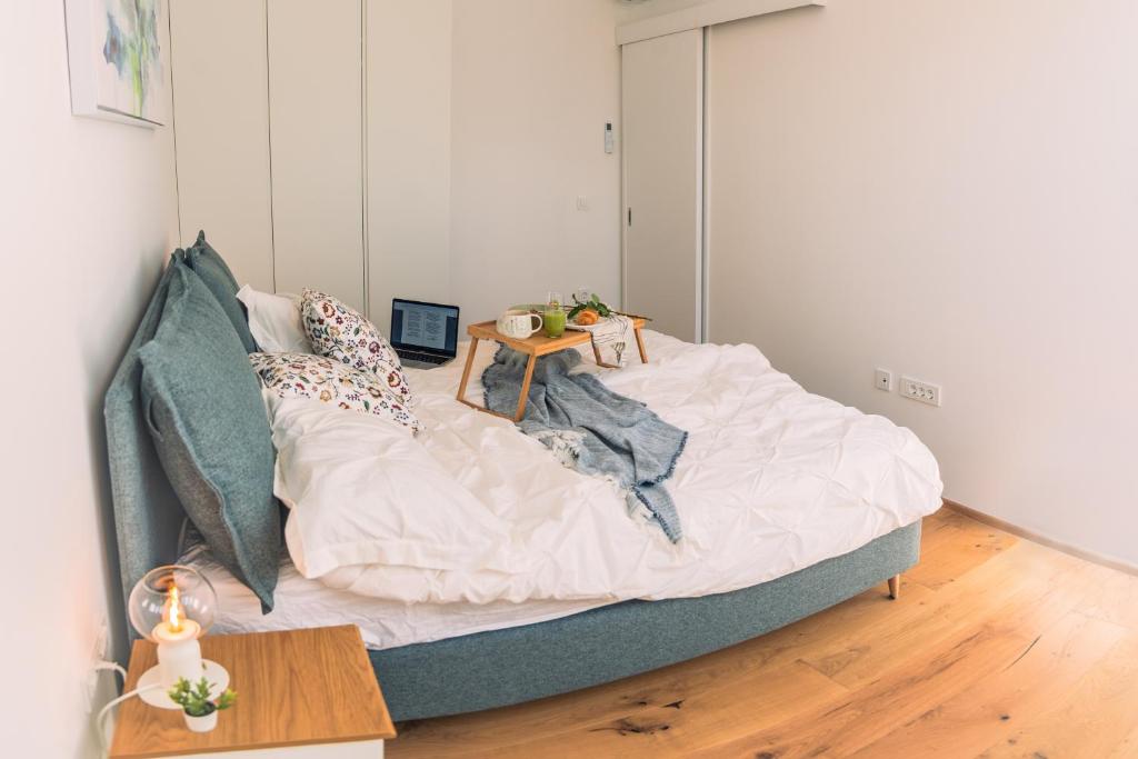 Postel nebo postele na pokoji v ubytování Apartma Zeleni Biser