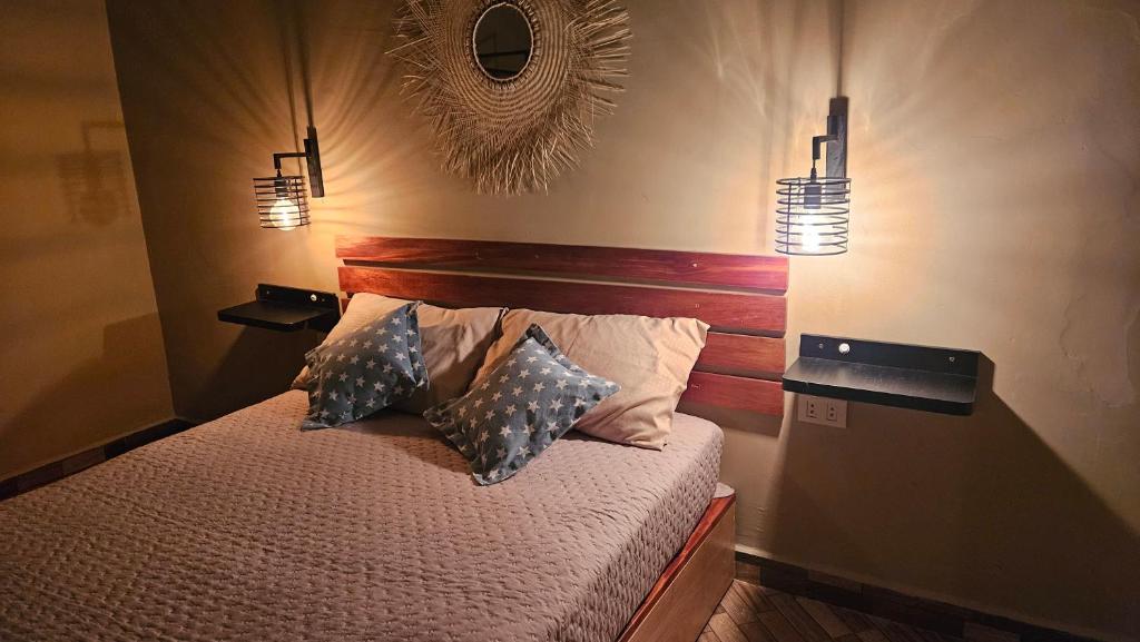 Postel nebo postele na pokoji v ubytování Casa Alamanda - Posada Urbana