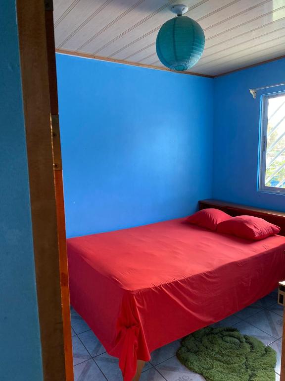 Кровать или кровати в номере Cabinas Mitchaelle's