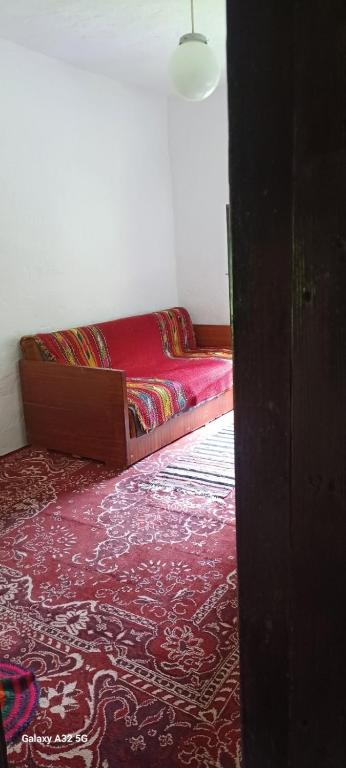 Postel nebo postele na pokoji v ubytování Stara Čakmara