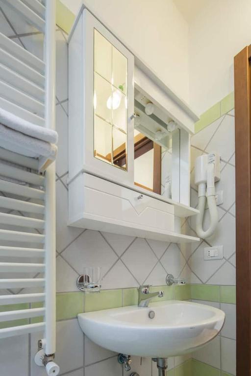 Koupelna v ubytování Casa Vacanze Dalisa Ulivo B con Parcheggio
