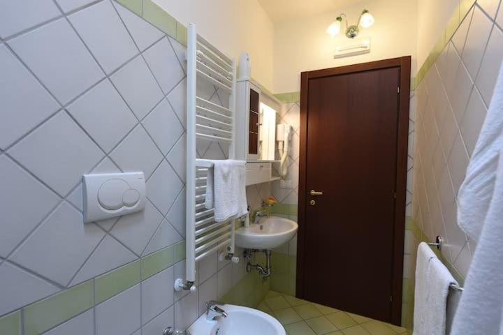 Koupelna v ubytování Casa Vacanze Dalisa Ulivo B con Parcheggio