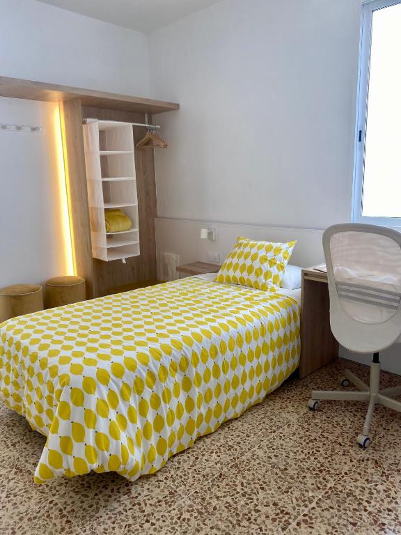 Postel nebo postele na pokoji v ubytování Guest House Espinardo
