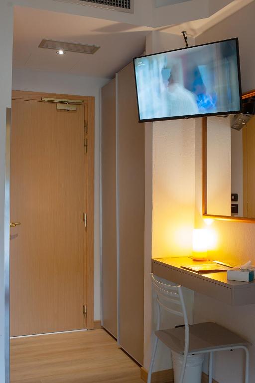 TV a/nebo společenská místnost v ubytování Hotel Savoia