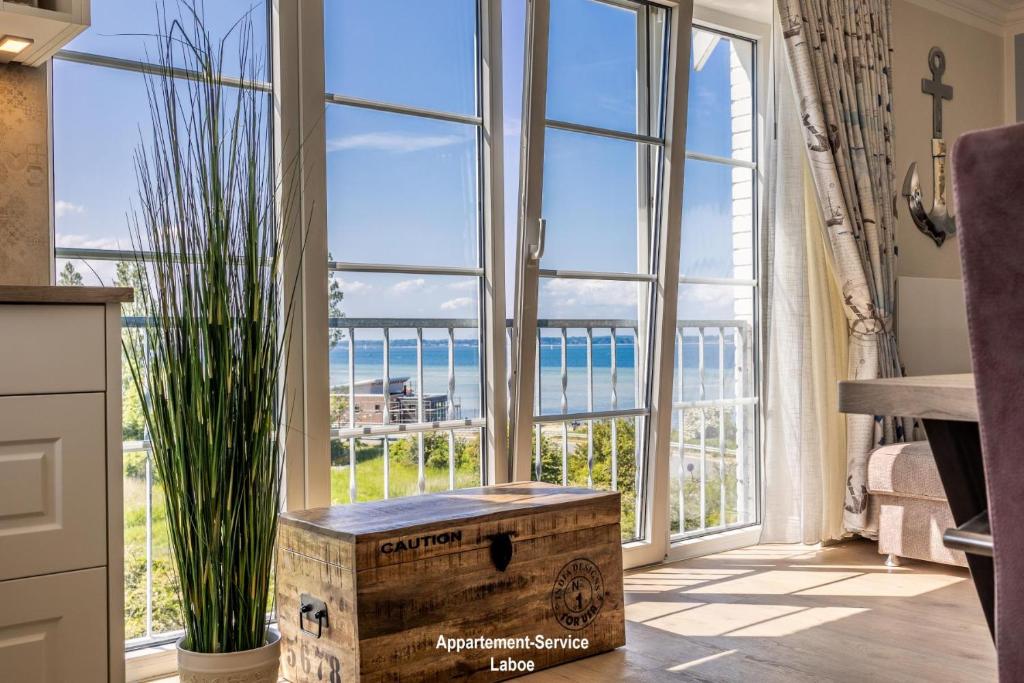 a large window with a view of the ocean at EdelStein in Stein