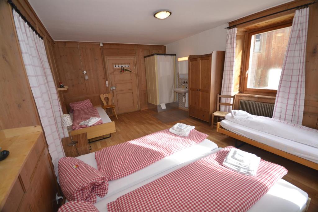 Postel nebo postele na pokoji v ubytování Gasthaus Schöntal