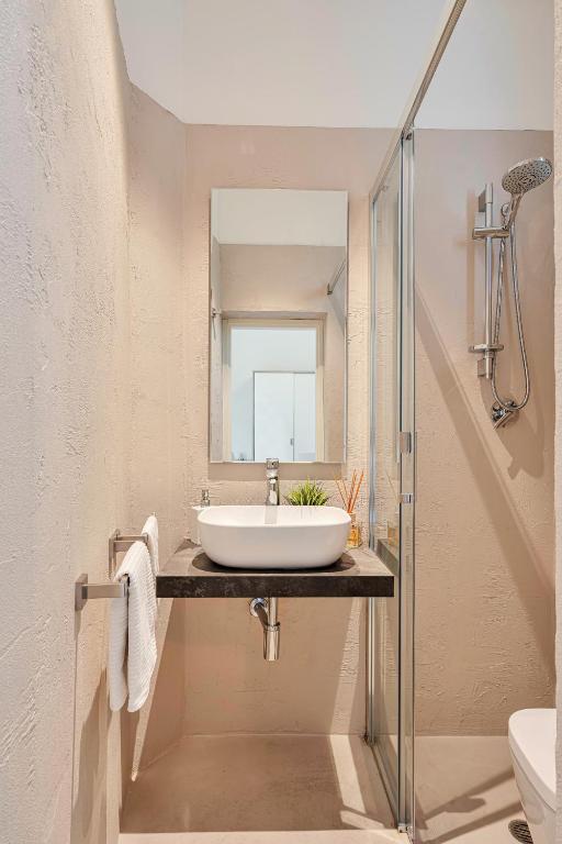 Koupelna v ubytování Hotel Lux
